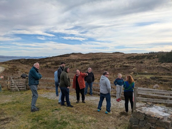 Participants touring a community-owned woodland on the Isle of Skye, Scotland
